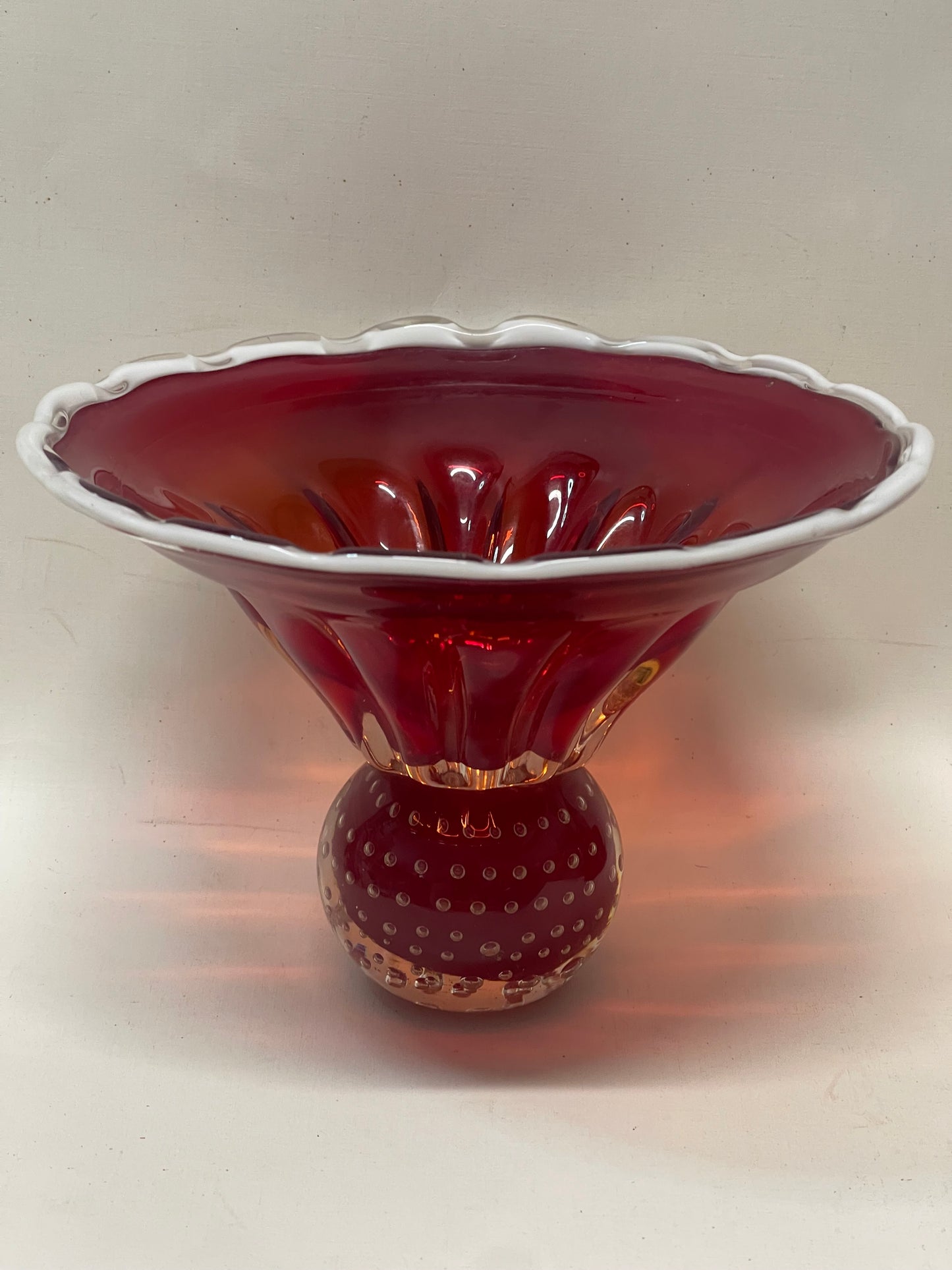 Mid-century Murano red glass bowl on spotted stand white trim