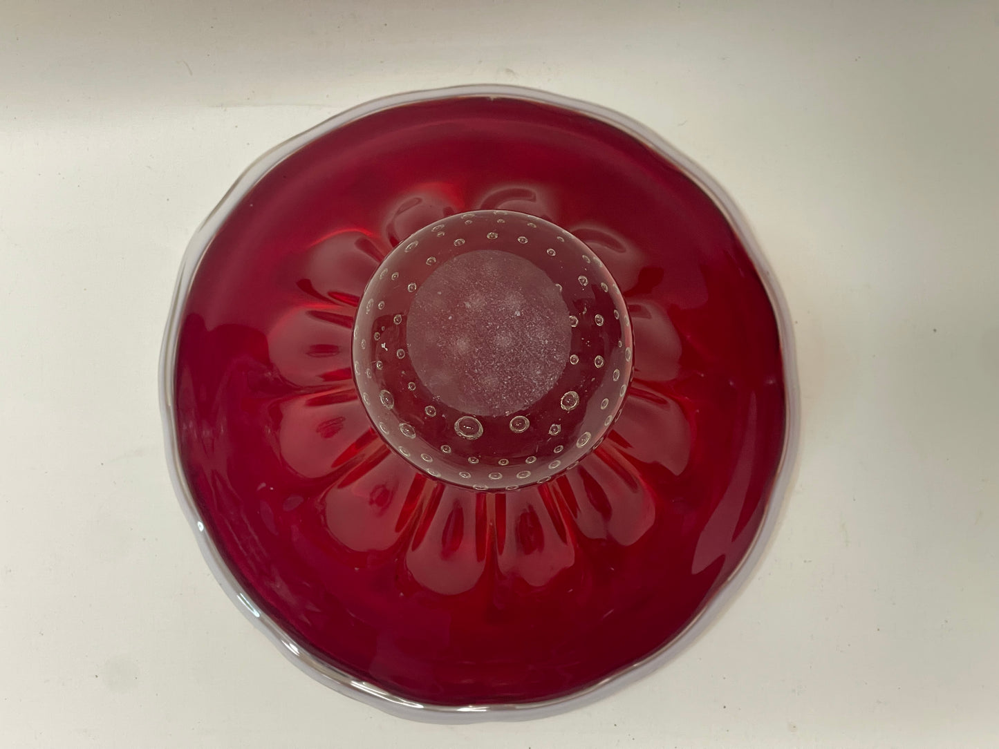 Mid-century Murano red glass bowl on spotted stand white trim