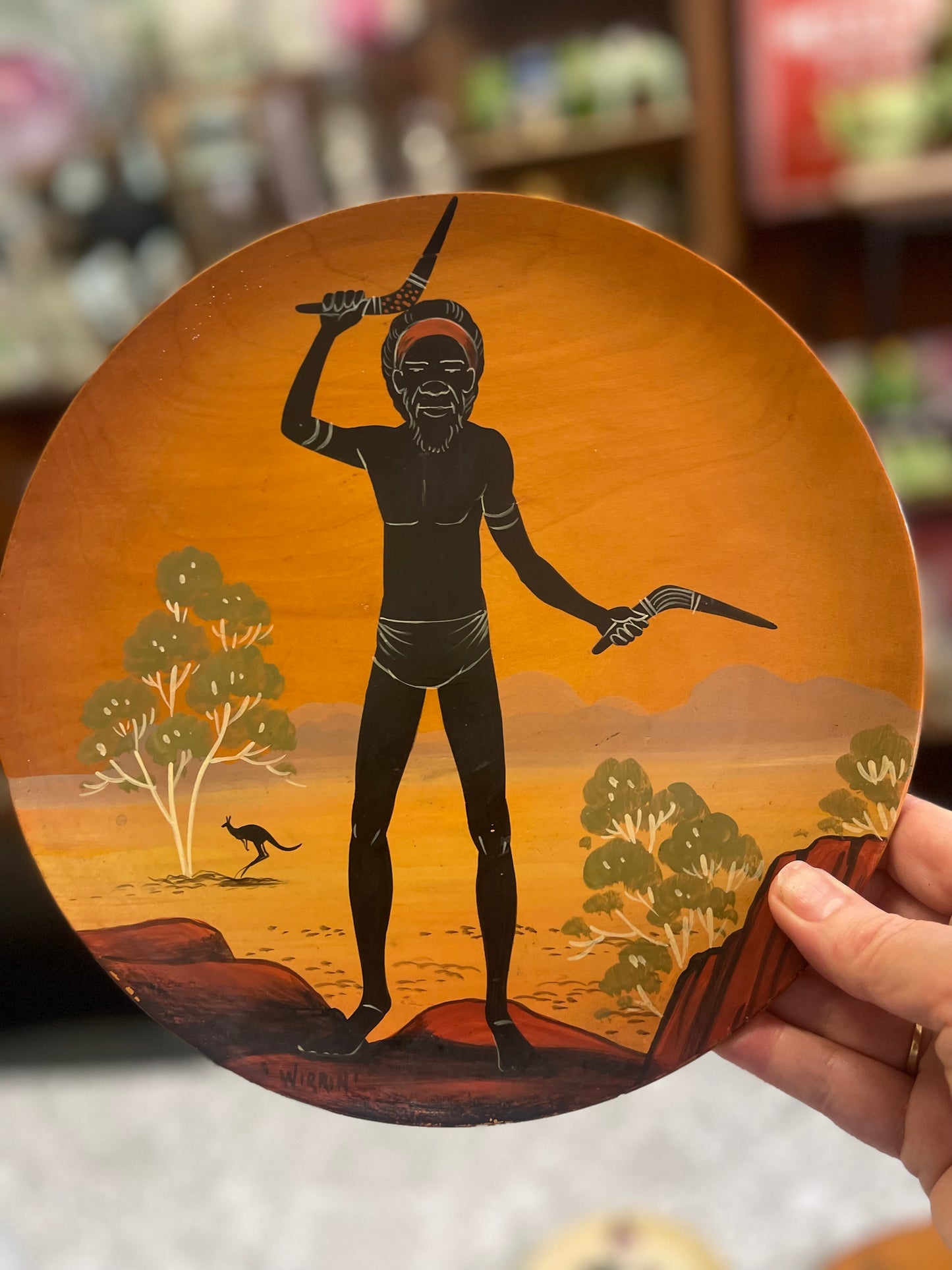 Vintage Australian Aboriginal Art painted medium timber plate by Bill Onus Wirrin, Pemunga NT with hunter
