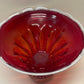Mid-century Murano red glass bowl on spotted stand white trim