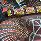 Basket of Hand-Painted Aboriginal-Inspired Souvenir Shells & Stones