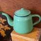 Vintage green enamel teapot