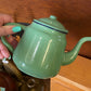 Vintage green enamel teapot