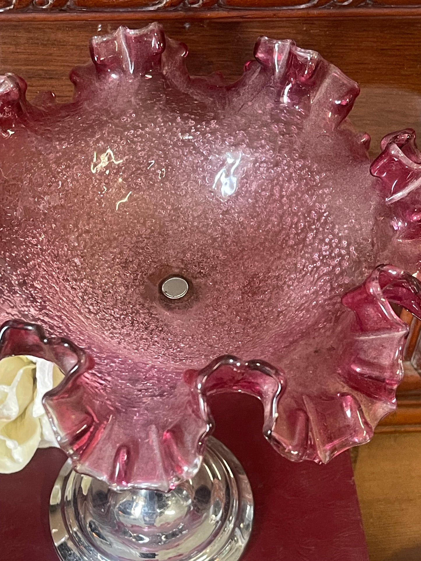 Vintage silver lady holding pink ruffled Sawtooth Edge Bowl