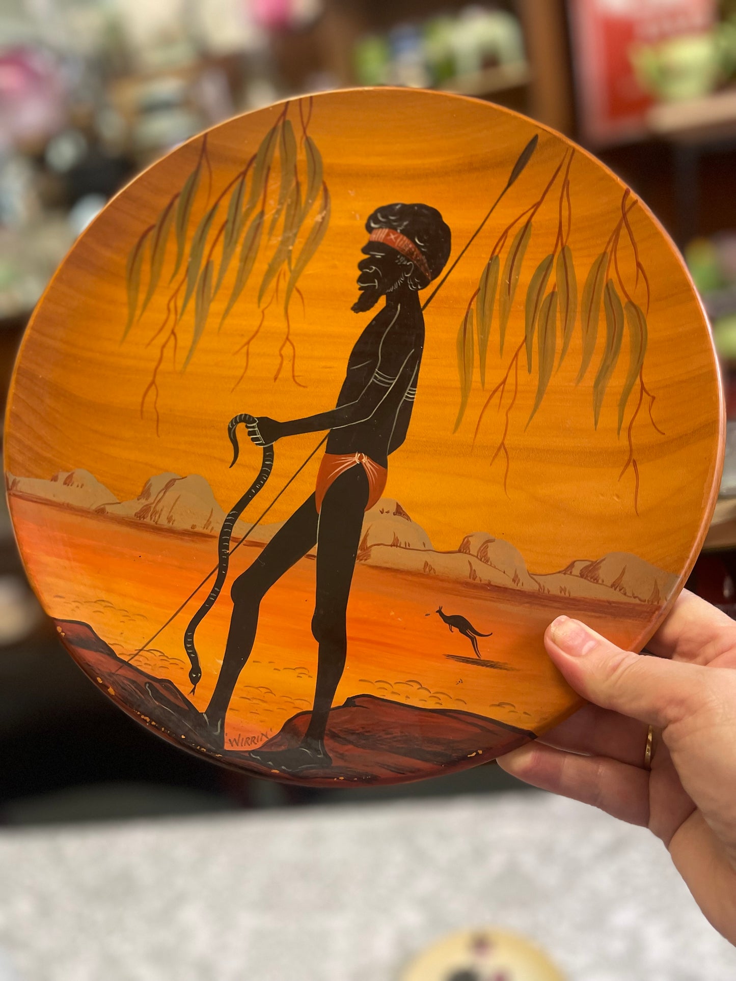 Vintage Australian Aboriginal Art painted large timber plate by Bill Onus Wirrin, Pemunga NT with hunter and snake