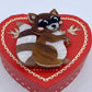 Love Bandit Racoon Brooch by Erstwilder and Carmen Hui (2020)