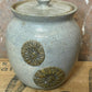 Handcrafted Pottery Lidded Crock with Applied Brown Flower Motifs