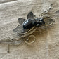 Artisan Wirework Brooch with Black Cabochon – Sculptural Design