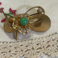 Vintage Mid-Century Floral Brooch with Green Glass Cabochon