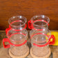 Set of Four Bodum Denmark glass coffee or tea mugs with Red Handles