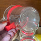 Set of Four Bodum Denmark glass coffee or tea mugs with Red Handles