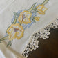 Vintage Hand-Embroidered Linen Table Runner – Yellow & Pink Floral with Crochet Lace