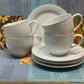 Noritake Japan Embossed White Cup & Saucer Set — Set of Four