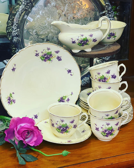 Set of four vintage teacups with violets