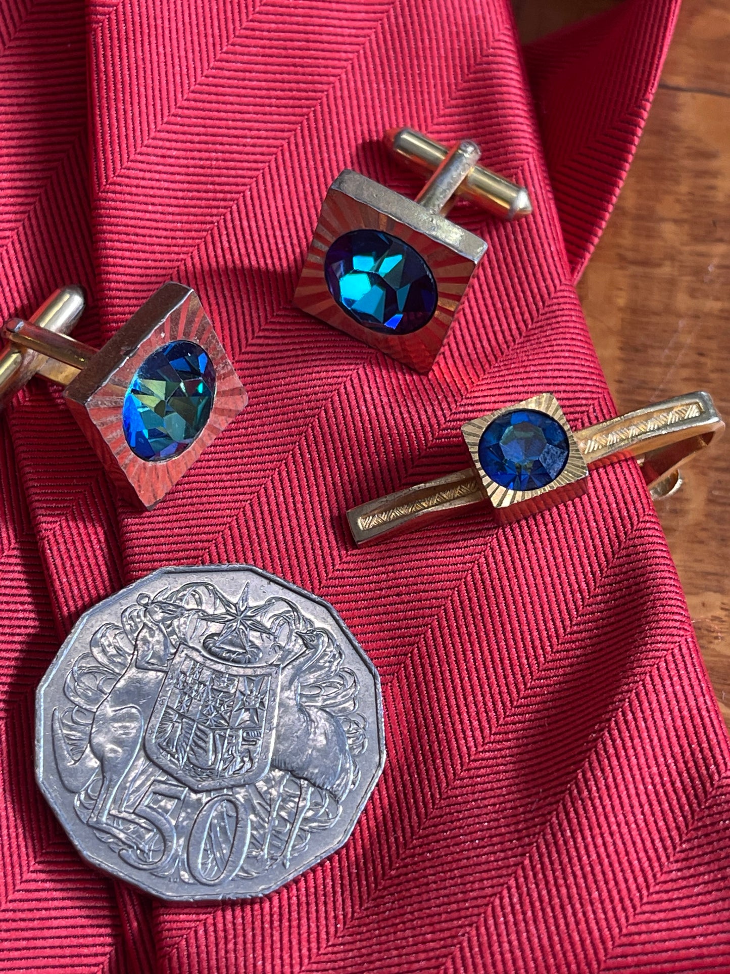 Vintage gold tone cuff links and tie clip with mystic topaz