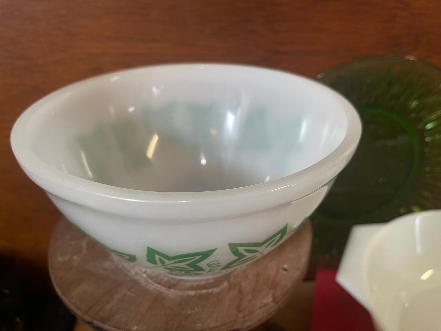 White Pyrex bowl with green grape leaf design 1960s