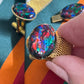 Vintage gold tone cuff links and tie clip with opal triplicates